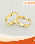 Two polished yellow gold rings