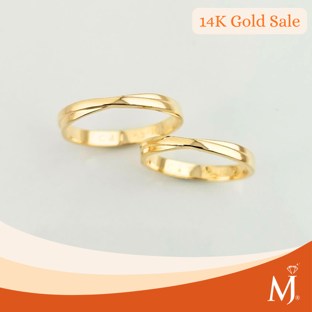 Two twisted 14K gold rings 