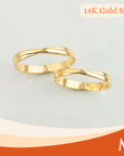 Two twisted 14K gold rings 