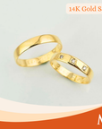 Two polished yellow gold rings